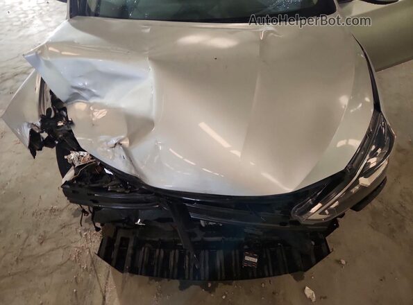 3N1AB7AP6KY325962 2019 NISSAN SENTRA Silver Rear interior view