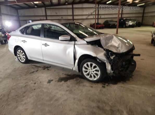 3N1AB7AP6KY325962 2019 NISSAN SENTRA Silver Front right