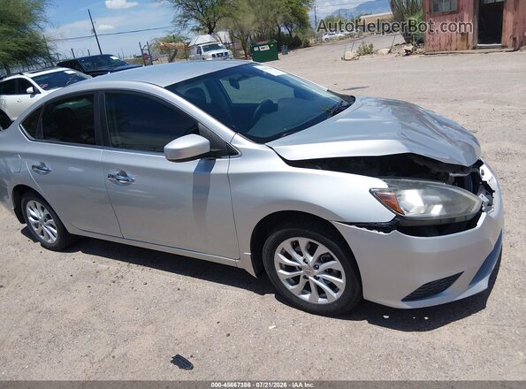 3N1AB7AP6KY424247 2019 NISSAN SENTRA Silver Սարքավորումների վահանակի տեսք