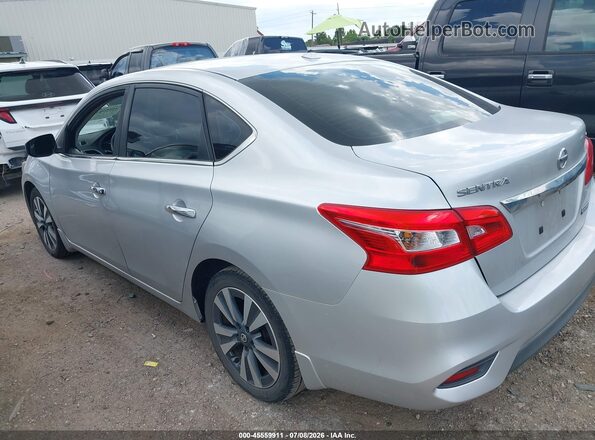 3N1AB7AP6KY437855 2019 NISSAN SENTRA Silver Հետևի ձախ