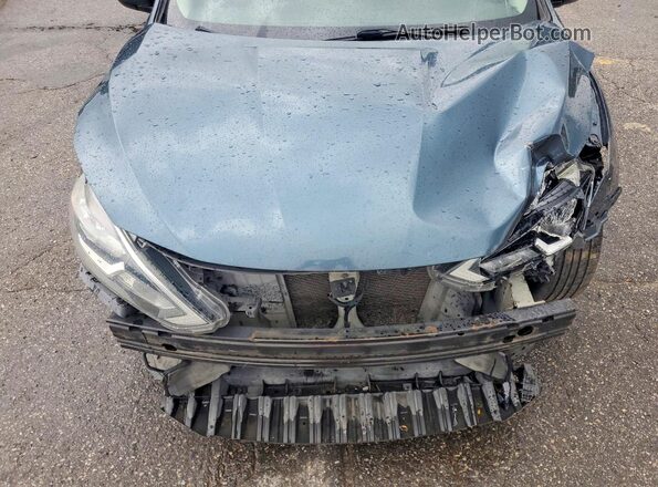 3N1AB7AP7HY228455 2017 NISSAN SENTRA Blue Вид задньої частини салону