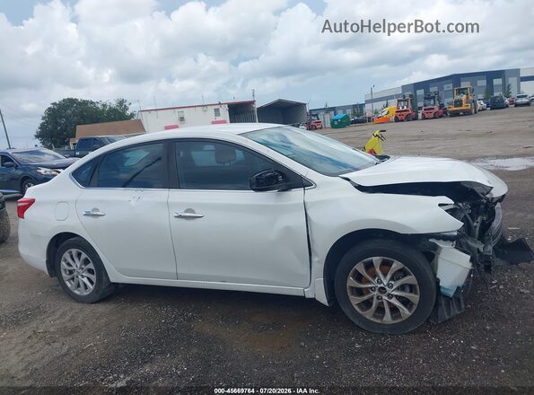 3N1AB7AP7JY229692 2018 NISSAN SENTRA White Rear interior view