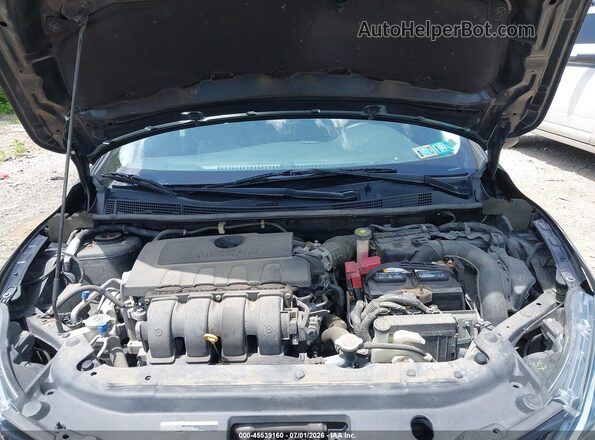 3N1AB7AP7JY255077 2018 NISSAN SENTRA Black Rear view