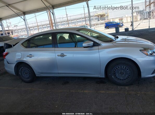 3N1AB7AP7JY255192 2018 NISSAN SENTRA Silver Rear interior view