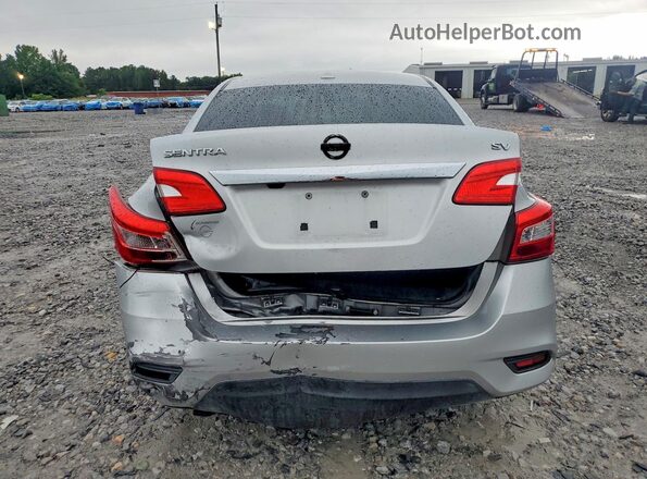 3N1AB7AP7JY282117 2018 NISSAN SENTRA Silver Rear view
