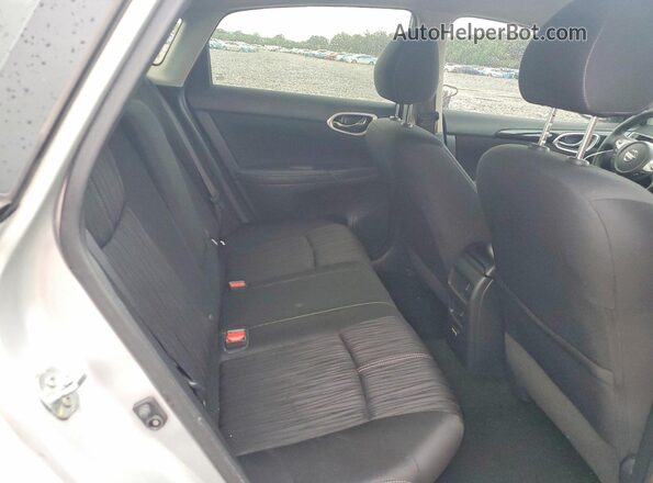 3N1AB7AP7JY282117 2018 NISSAN SENTRA Silver Rear seats view