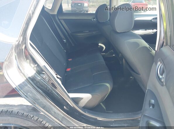 3N1AB7AP7JY338931 2018 NISSAN SENTRA Black Widok naklejki z numerem VIN