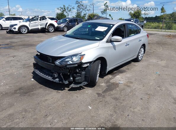 3N1AB7AP7JY340971 2018 NISSAN SENTRA Silver Vista tres cuartos delantera izquierda