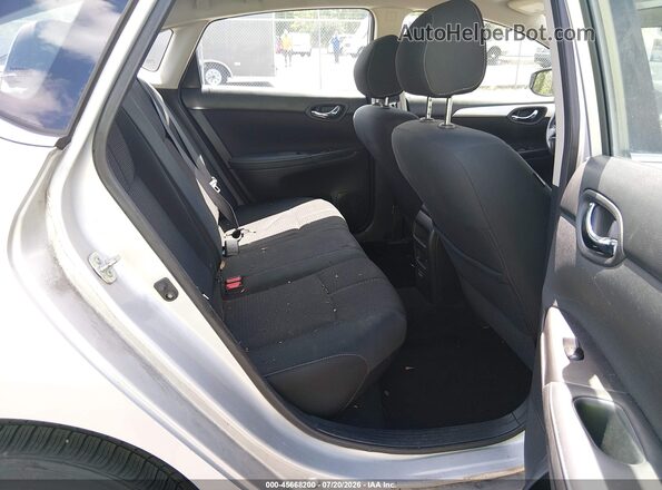 3N1AB7AP7JY340971 2018 NISSAN SENTRA Silver Vista de la etiqueta del VIN