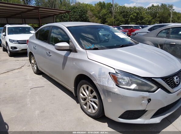 3N1AB7AP7KL607881 2019 NISSAN SENTRA Silver Вид задньої частини салону