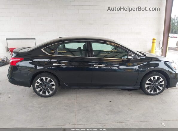 3N1AB7AP7KY369890 2019 NISSAN SENTRA Black Rear interior view