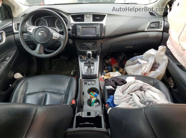 3N1AB7AP8HY409211 2017 NISSAN SENTRA Серый Вид панели приборов