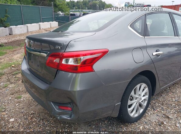 3N1AB7AP8JY289299 2018 NISSAN SENTRA Серый Вид спереди