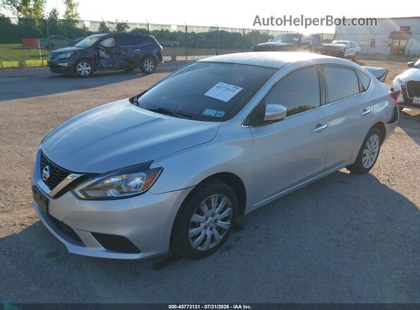 3N1AB7AP8JY311558 2018 NISSAN SENTRA Silver წინა მარცხენა ხედი სამი მეოთხედიდან