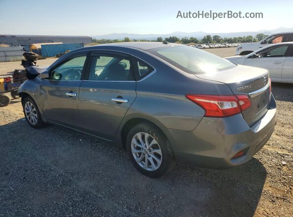 3N1AB7AP8KL624754 2019 NISSAN SENTRA Silver Trasero izquierdo