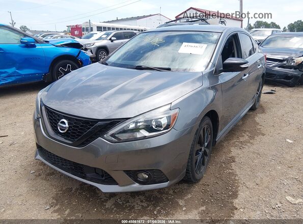 3N1AB7AP9JY242976 2018 NISSAN SENTRA Серый Передняя левая четверть
