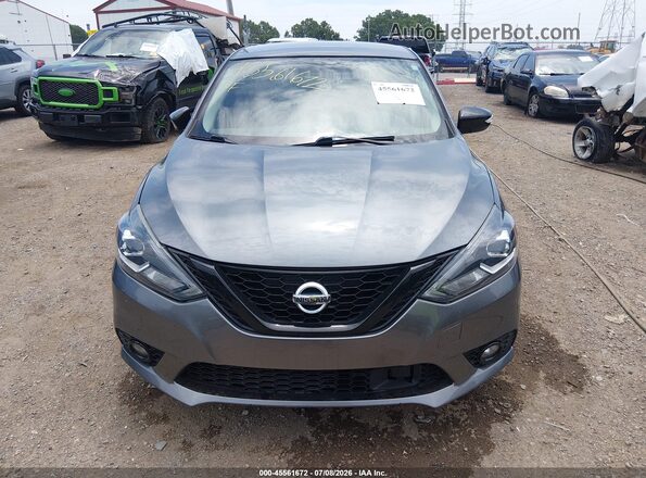 3N1AB7AP9JY242976 2018 NISSAN SENTRA Серый Вид щитка приборов