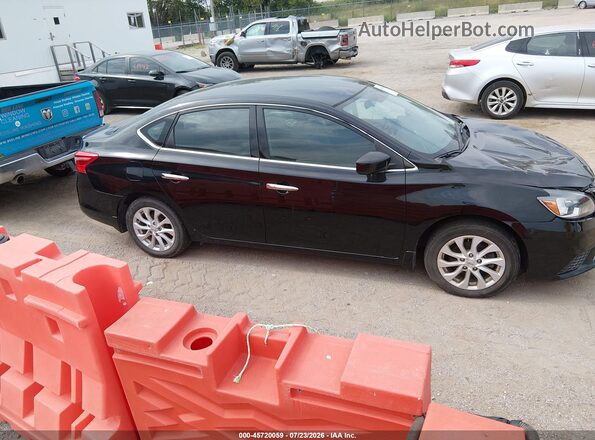 3N1AB7AP9KL607400 2019 NISSAN SENTRA Черный Вид задней части салона