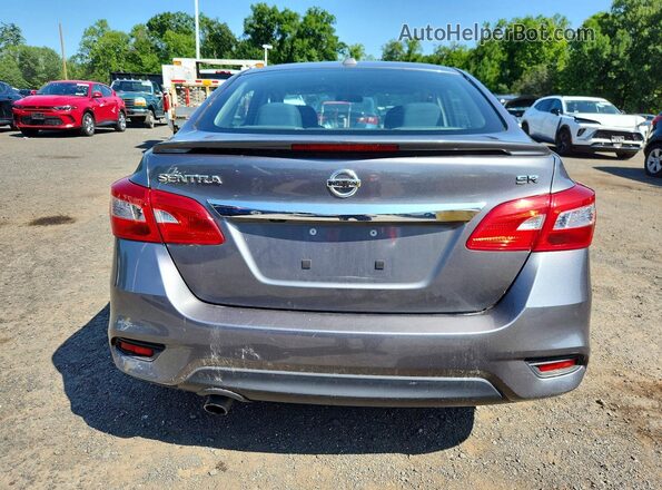 3N1AB7AP9KY371219 2019 NISSAN SENTRA Gray Rear view