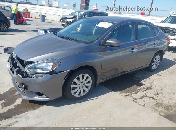 3N1AB7AP9KY390675 2019 NISSAN SENTRA Gray Vista tres cuartos delantera izquierda