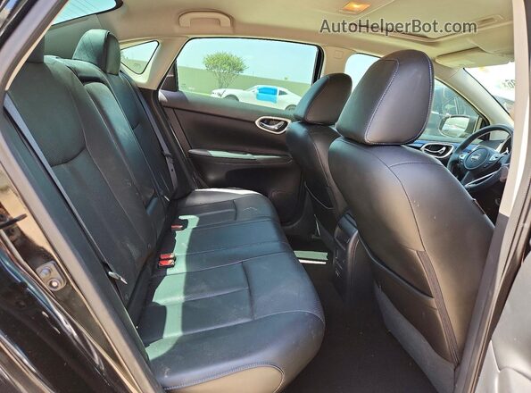 3N1AB7APXJY221554 2018 NISSAN SENTRA Black Rear seats view