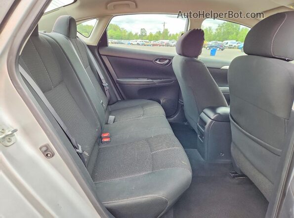 3N1AB7APXJY246731 2018 NISSAN SENTRA Silver Rear seats view