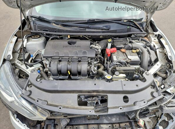 3N1AB7APXJY246731 2018 NISSAN SENTRA Silver Rear interior view