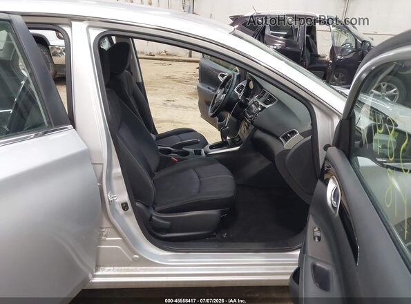 3N1AB7APXJY292222 2018 NISSAN SENTRA Silver Front interior view