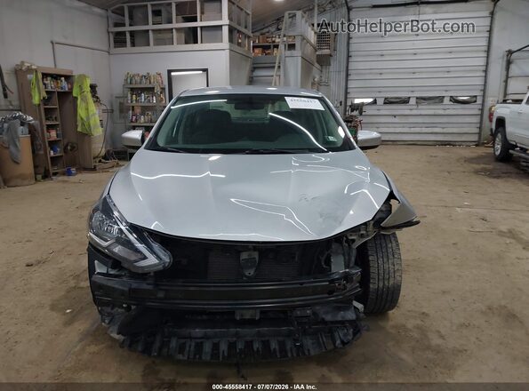 3N1AB7APXJY292222 2018 NISSAN SENTRA Silver Rear interior view