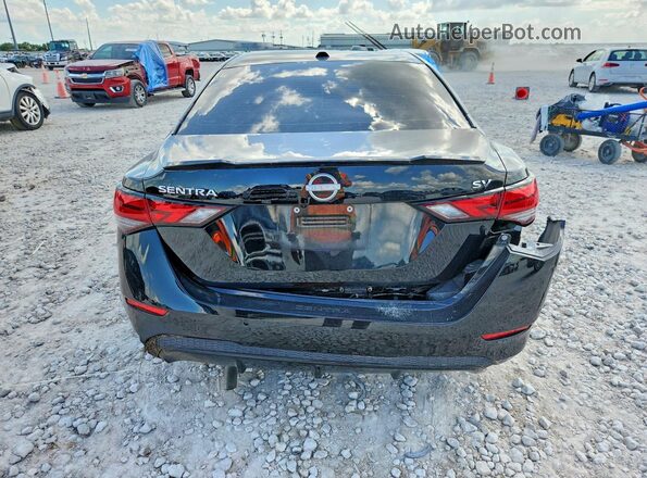 3N1AB8CV1RY359285 2024 NISSAN SENTRA Black Rear view