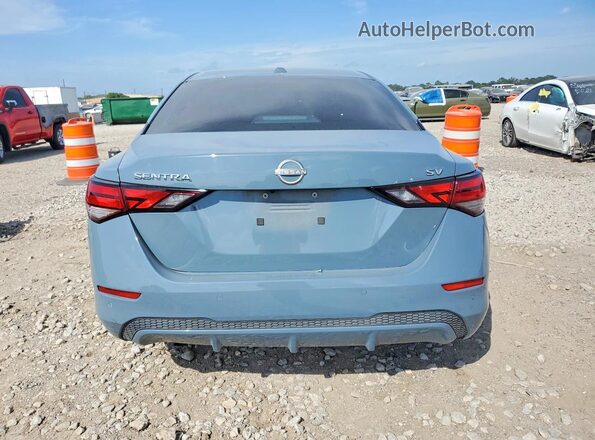 3N1AB8CV2RY223294 2024 NISSAN SENTRA Blue Вид ззаду