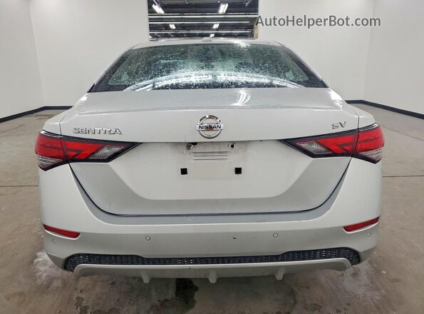 3N1AB8CVXPY279979 2023 NISSAN SENTRA Silver Вид ззаду