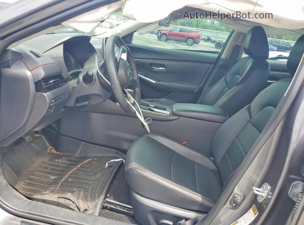 3N1AB8DV0PY319680 2023 NISSAN SENTRA Серебряный Вид салона спереди