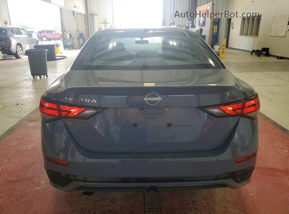 3N1AB8DV1RY294243 2024 NISSAN SENTRA Teal Rear view