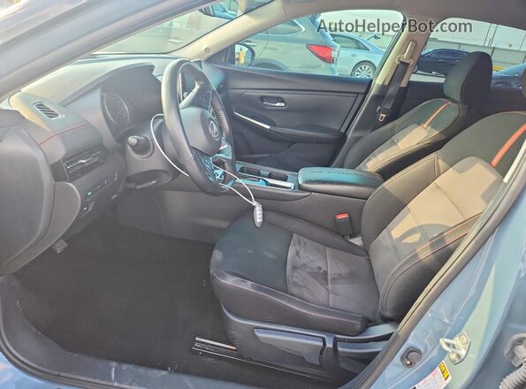 3N1AB8DV8RY242110 2024 NISSAN SENTRA Серый Вид салона спереди