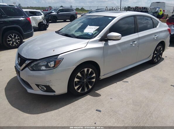 3N1CB7AP7JY201819 2018 NISSAN SENTRA Серебряный Передняя левая четверть