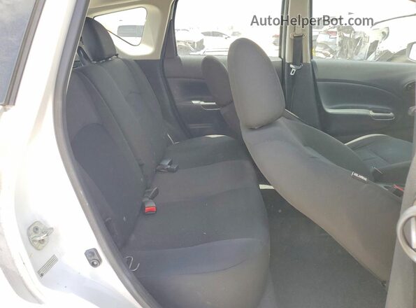 3N1CE2CP7HL369670 2017 NISSAN VERSA White Rear seats view
