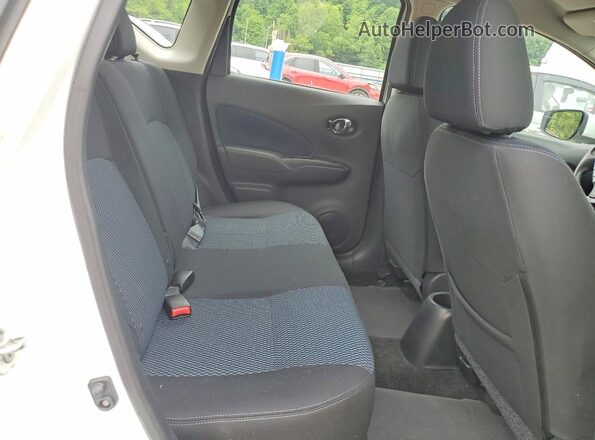 3N1CE2CP8JL357565 2018 NISSAN VERSA White Vista de los asientos traseros