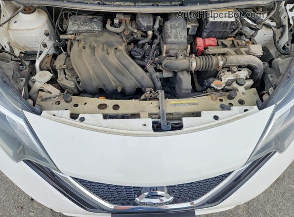 3N1CE2CPXJL366039 2018 NISSAN VERSA White Rear interior view