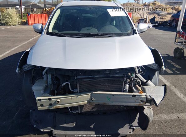 3N1CN7AP1KL851056 2019 NISSAN VERSA Серебряный Вид задней части салона