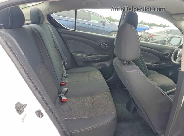 3N1CN7AP3GL834945 2016 NISSAN VERSA White Vista de los asientos traseros