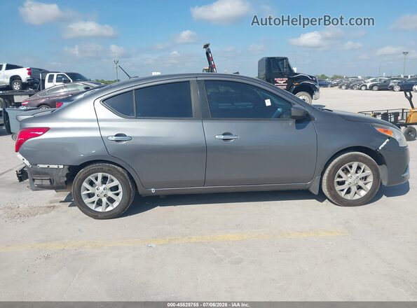 3N1CN7AP4KL811151 2019 NISSAN VERSA Серебряный Вид задней части салона