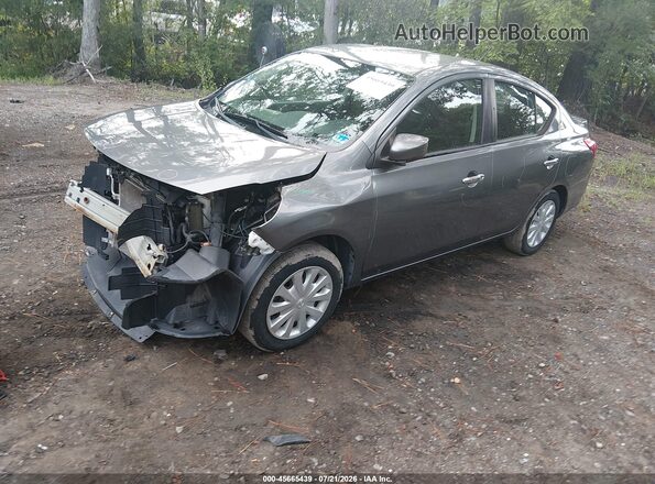 3N1CN7AP6KL865907 2019 NISSAN VERSA Gray Առջևի ձախ երեք քառորդ տեսարան