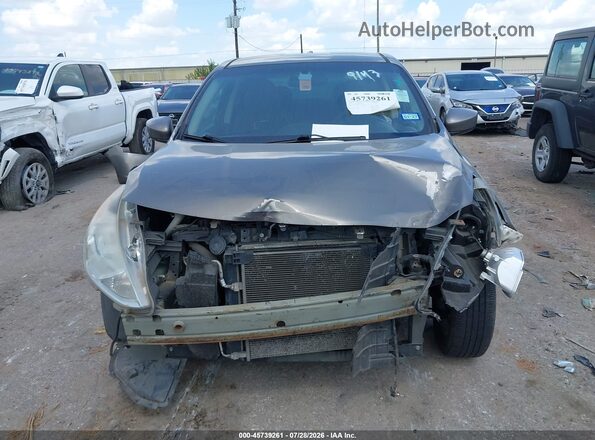 3N1CN7AP8GL829143 2016 NISSAN VERSA Gold Widok wnętrza z tyłu