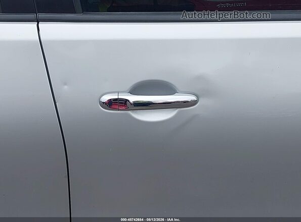 3N1CN7APXJL837638 2018 NISSAN VERSA Silver Սալոնի հետևի տեսք