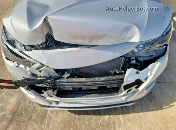 3N1CN8DV7SL867942 2025 NISSAN VERSA Silver Widok wnętrza z tyłu