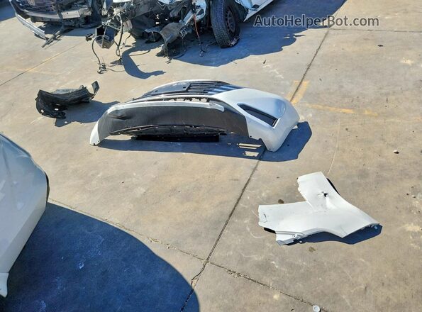3N1CN8EV4SL875141 2025 NISSAN VERSA White Vista del compartimento del motor