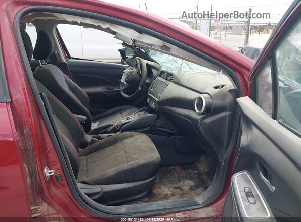 3N1CN8FV3PL857042 2023 NISSAN VERSA Красный Вид салона спереди