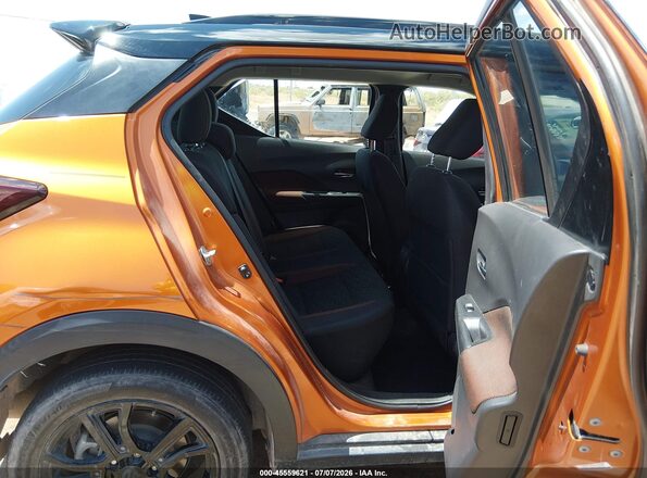 3N1CP5DV7PL497107 2023 NISSAN KICKS Orange VIN sticker view