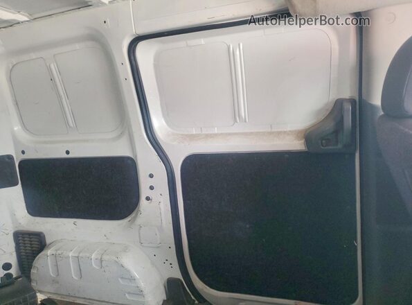 3N6CM0KN2KK699005 2019 NISSAN NV200 White Widok wnętrza z tyłu